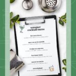 A cocktail bar menu on a clipboard with limes, mint, and a cocktail shaker on a green background—perfect inspiration for crafting a home cocktail menu.