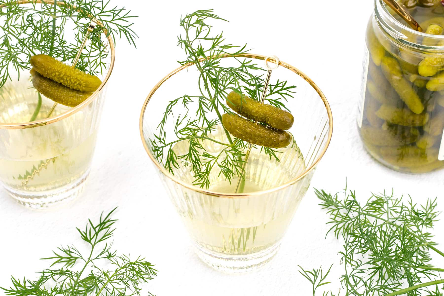 A briny twist on the martini, bold and savory with a pickle finish.