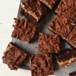 These tri-layer Chocolate Peanut Butter Pretzel Brownies are a decadent dessert for parties! (feastandwest.com)