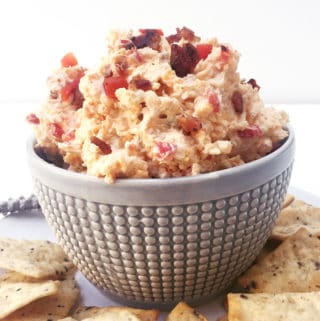 Bacon Pimento Cheese is the Southern salty cheese spread that will make your party guests happy. (via feastandwest.com)