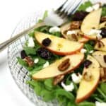 Apple Pecan Salad with Zesty Apple Dressing makes for the perfect salad for your holiday dinner party. Apples, goat cheese, pecans and dried cranberries sit atop a bed of greens and are drizzled with a sweet-and-sour dressing made with Martinelli’s Apple Juice or Cider and fresh lemons. (via feastandwest.com)