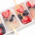 Boozy and patriotic Prosecco Popsicles are the cutest way to show your colors this holiday weekend! Berries and frozen champagne make for a darling red, white and blue treat you can enjoy anytime! Click through to watch the video! (via feastandwest.com)