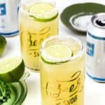two beerita cocktails next to beer cans