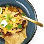 above view of bowls of easy chicken tortilla soup