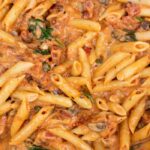 Close up of Penne pasta with rosa sauce