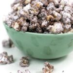 a heaping bowl of puppy chow popcorn
