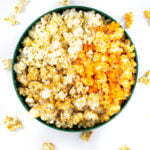 top view of a popcorn tin with three kinds of popcorn