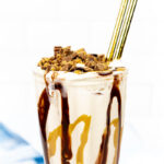 closeup of peanut butter candy on a milkshake