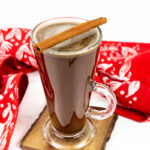 spiced hot buttered rum in an Irish coffee mug