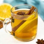 a bourbon hot toddy cocktail in a glass mug