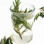 a jar of rosemary simple syrup