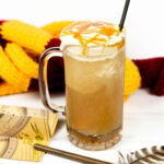 frozen butterbeer with a quill and a map of hogsmead