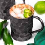 jalapeños garnishing a spicy Moscow mule