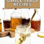 A glass jar of clear simple syrup with a gold spoon sits in front of bottles of various syrups. Text reads “21 Simple Syrup Recipes,” inspiring you to explore new simple syrup recipes for your favorite drinks and desserts.