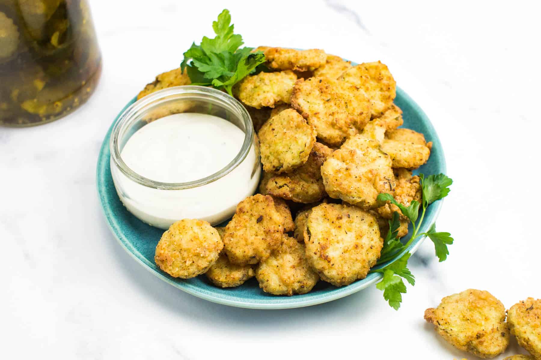 Crispy fried pickle chips with a tangy bite.