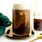 Irish cream cold brew on a gold tray