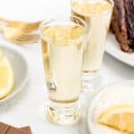 Chocolate Cake Shooters next to chocolate squares and chocolate cake.
