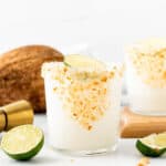 A coconut margarita with lime and coconut.