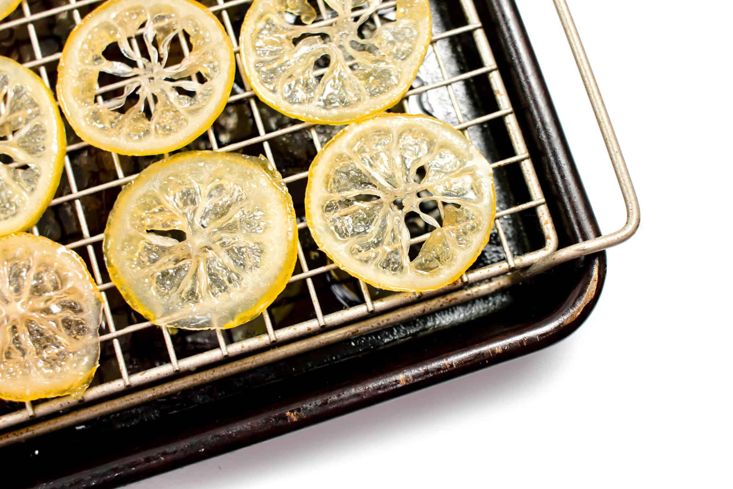 Thin lemon slices cooked in sugar syrup until glossy and sweet.