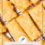 Rectangular cheese straws with a golden, flaky appearance are arranged on a cooling rack. The text "Cheese Straws" appears at the bottom.