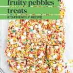 Tray of Fruity Pebbles treats cut into squares, topped with mini marshmallows, displayed on parchment paper; text overlay promoting a kid-friendly recipe.