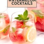 A glass of refreshing watermelon cocktail with ice, lemon slices, watermelon balls, and mint leaves sits next to a pitcher and another glass of delicious watermelon cocktails.