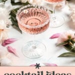 Two crystal coupe glasses filled with pink cocktails are surrounded by white flowers and pink petals on a light surface. Text reads: "Signature Cocktails for Weddings.
