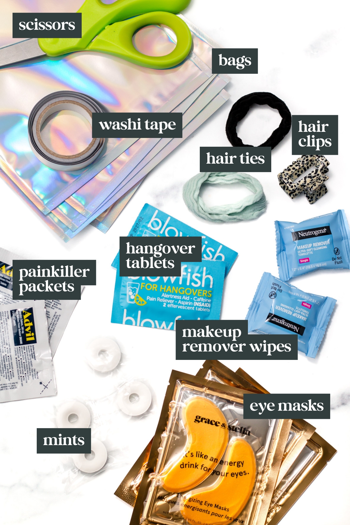 A flat lay of various items labeled: scissors, bags, washi tape, hair ties, hair clips, hangover tablets, painkiller packets, makeup remover wipes, mints, and eye masks.
