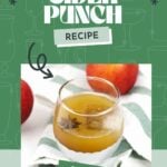 A glass of apple cider punch garnished with a star anise sits on a striped cloth, with apples in the background and text promoting the recipe.