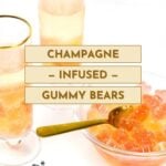 Two champagne glasses and a bowl of orange gummy bears are shown, with a gold spoon resting on the bowl. Text overlay reads: "Champagne-infused gummy bears.