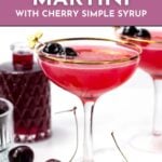 A cherry martini garnished with cherries in a coupe glass, with a bottle of cherry syrup and a glass of ice in the background. Text reads: "Cherry Martini with Cherry Simple Syrup. Get the recipe.