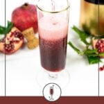 A glass being filled with pomegranate mimosa, surrounded by a pomegranate, cork, holly, and a wine bottle.