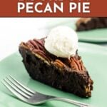 A slice of chocolate bourbon pecan pie topped with a scoop of vanilla ice cream on a green plate with a fork.