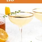 A coupe glass with a golden cocktail, garnished with a lemon twist and thyme, sits beside a sliced lemon and another drink on a white surface. Text reads "gifts for gin lovers.