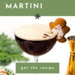 A glass of espresso martini garnished with a decorated gingerbread cookie, with a gold jigger and a plate of cookies in the background. Text reads "Gingerbread Espresso Martini.