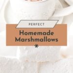 A white mug of hot chocolate topped with large marshmallows is shown above a stack of homemade marshmallows on a white background. Text reads: "Perfect Homemade Marshmallows.