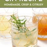 Three patterned glasses with different colored drinks, one garnished with a sprig of rosemary, promoting a zero-proof gin recipe with text overlay.