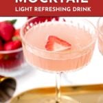 A glass of pink strawberry mocktail garnished with a strawberry slice, with strawberries and a cocktail tool in the background. Text reads: "Strawberry Mocktail – Light Refreshing Drink. Get the recipe.