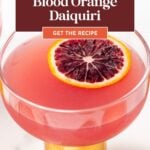 A glass of blood orange daiquiri garnished with a slice of blood orange, with text overlay promoting an easy recipe.