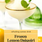 A frozen lemon daiquiri in a cocktail glass garnished with a mint sprig and striped straw, with lemons and a citrus press in the background. Text overlay reads "Frozen Lemon Daiquiri.