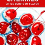 Bright red cherries dipped in white chocolate and blue sugar, arranged on a plate with text promoting a recipe.