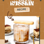 A glass of tiramisu white Russian cocktail topped with a ladyfinger, with decadent tiramisu slices in the background.