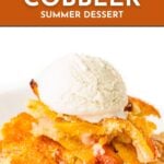 A slice of peach cobbler topped with a scoop of vanilla ice cream on a white plate.