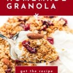 A spoonful of homemade granola with yogurt, cranberries, and almonds, with text promoting a recipe.