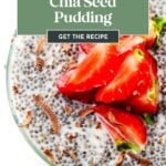 A bowl of chia seed pudding topped with sliced strawberries and chocolate shavings.