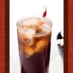 A tall glass of dark cocktail with ice and a red-striped straw, labeled “Tootsie Roll cocktail.”.
